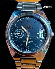 Orient Three Star Tropical Day Date Watch 50m Black Dial Automatic Working