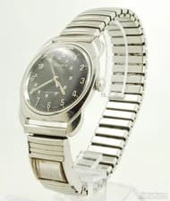 Bulova wrist watch, 17 jewels, thin SS WR case, Canadian dial, calendar band