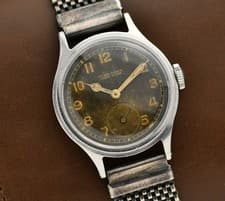 Vintage ULYSSE NARDIN - F. Borgel Screw Stepped Case- Tropical Dial - 40's Watch