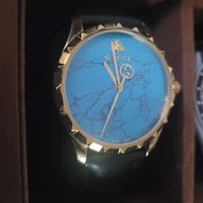 Gucci Turquoise Men's Watch with Gold Bezel and Black Leather Strap