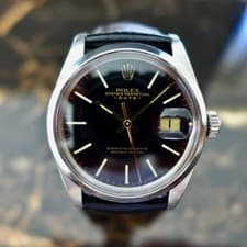 A STUNNING GENTS 1980 ROLEX OYSTER PERPETUAL DATE REF. 1500 STAINLESS STEEL
