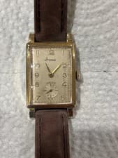 Stowa watch tank style 10K gold filled 16 rubies with extra band.