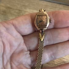 Vintage  Ladies Bulova 14kt  gold case, & Gold-Tone Band Analog Wristwatch