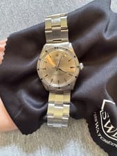 Rolex Oyster Perpetual 1007 Silver Oyster Bracelet with Silver Bezel