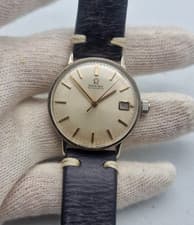 VINTAGE OMEGA SILVER DIAL DATE MANUAL WIND MAN'S WATCH / X035