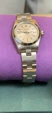 Rolex Oyster Perpetual Champagne Dial Silver Stainless Steel Analog Wristwatch