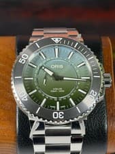 Oris Aquis Dat Watt Limited Edition. Extra strap.  Unworn and still stickered!