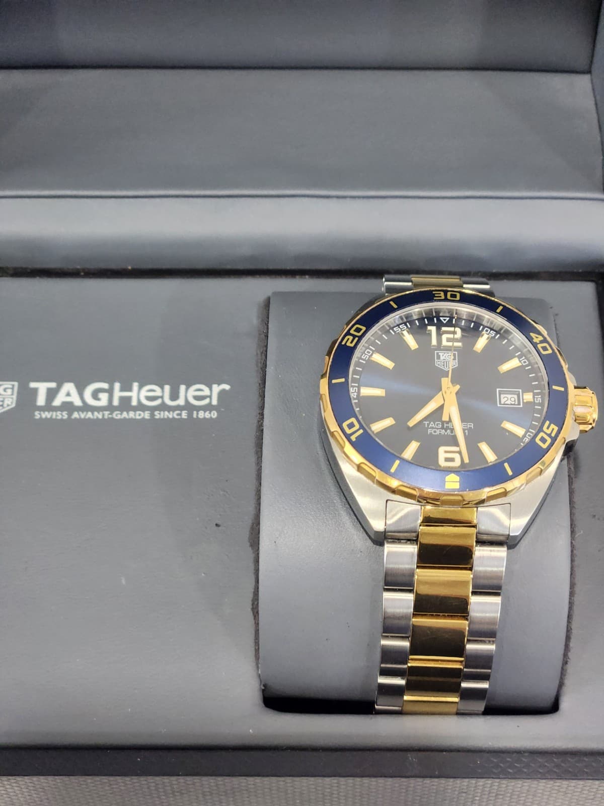 TAG Heuer Formula 1 Blue Men's Watch - WAZ1120.BB0879.  Gold and silver band