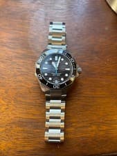 tag heuer aquaracer automatic 300m - never worn, excellent condition.