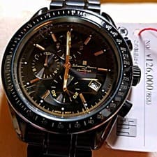 Full black, center chronograph, production model. #QYC0Y8