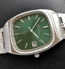 VINTAGE SEIKO GRAND QUARTZ 9942-5000 EMERALD DIAL DATE DRESS MEN'S WATCH