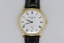 Patek Philippe Calatrava 5119R White Roman Dial Leather Strap Box & Papers