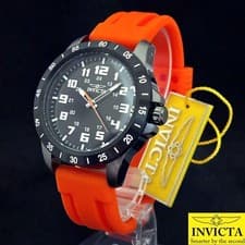 Invicta black dial watch, bold orange band, 45mm sporty design, 100m resistant.