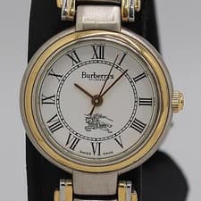 Used Good working Burberry 8000 QZ White dial with 4 frames Ladies watch