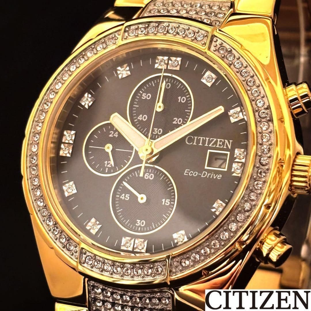 Gold-tone CITIZEN chronograph, black dial, Eco-Drive, bold 42mm luxury watch.