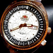Orient World Map Day Date Automatic Watch with Gold Bezel and Genuine Strap