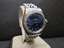 Rolex Oyster Perpetual Blue Dial Diamond Bezel 24mm Steel Ladies Watch 67180