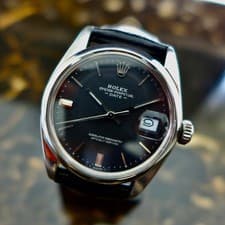 A STUNNING GENTS 1966 ROLEX PERPETUAL DATE "RULETTE DATE RED/BLACK REF. 1500