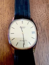 Universal Genève Tiffany & Co 18kt Gold Wristwatch Date Gold Dial Black Strap