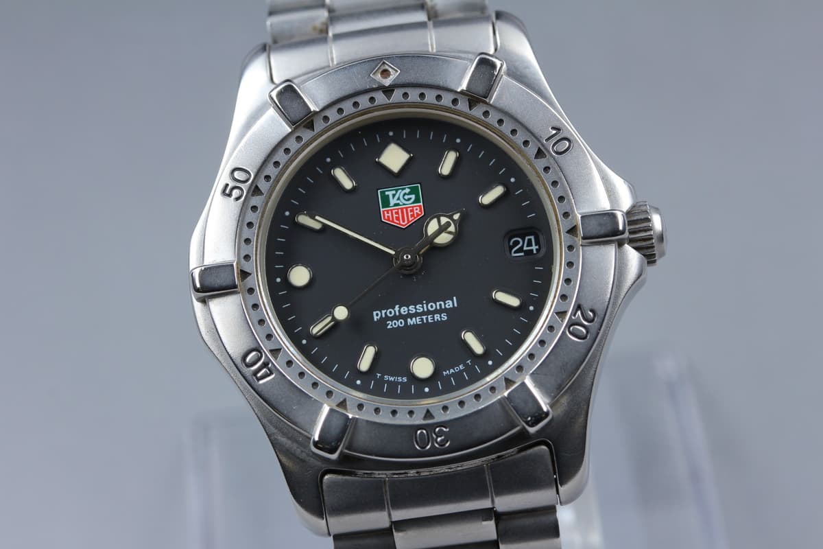 Vtg TAG Heuer Professional 2000 WE1210-R Black Mens S-Size Qz Watch From JAPAN