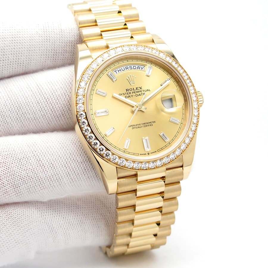 Rolex 228348RBR Day Date 40 18K Yellow Gold with Champagne Diamond Baguette Dial