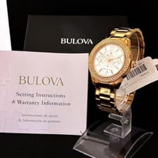 Elegant BULOVA rose gold watch with crystal accents, feminine, timeless design.
