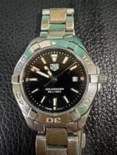 Tag Heuer Woman's Aquaracer new battery, black dial, tight bracelet