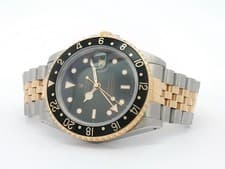 Rolex GMT-Master II Black Dial 18kt Yellow Gold & Stainless Steel Jubilee 16713