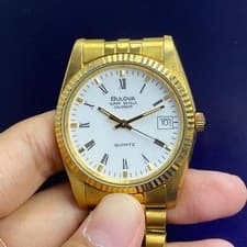 RARE Bulova Super Seville Calendar Quartz White Dial Roman Index Gold Vintage