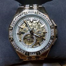 Bulova Octava Gold Tone Stainless Steel Crystal Skeleton Automatic Watch 98A292