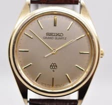 SEIKO GRAND QUARTZ 9940 8010 Wristwatch Timepiece Silver Dial Gold Case Vintage