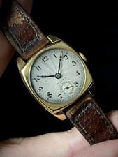 1927 Rolex 18ct gold cushion case watch ref 554 Guilloche sunburst dial