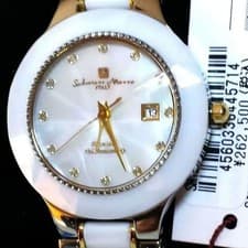 Highly impressive white shell and 12 diamonds included. #QYCG0J