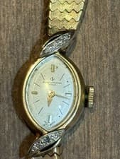 Baume & Mercier 14 K Gold Diamond Watch. Ladies. Swiss