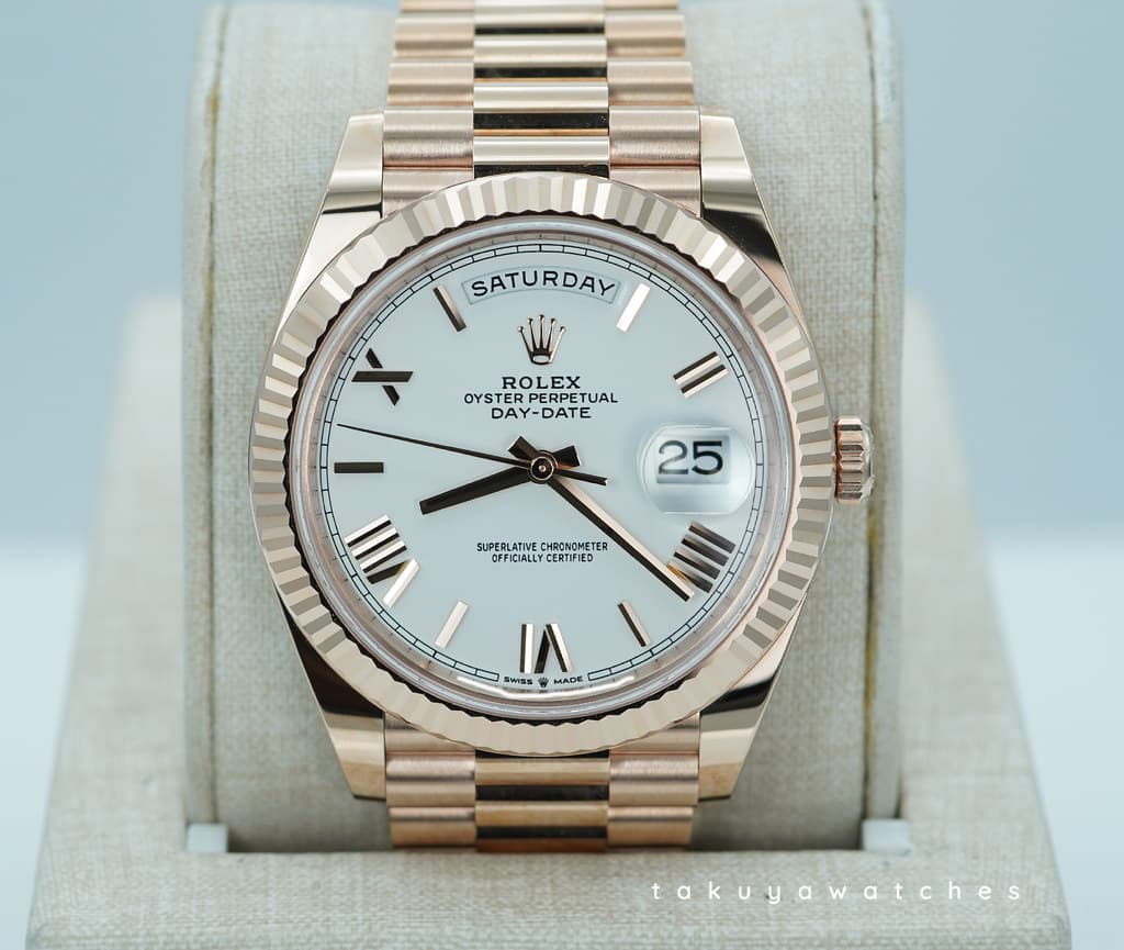 FSOT: Rolex 228235 DAY DATE 40 ROSE GOLD WHITE ROMAN DIAL 2023 WARRANTY FULL SET