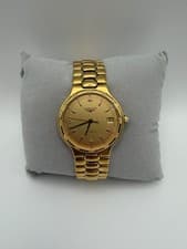 Authentic Longines Conquest automatic watch in elegant gold-tone finish