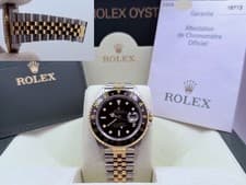 2006 Rolex GMT Master II 16713 40mm Black Dial 18k Gold Steel Jubilee Box Papers