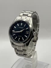 Citizen Exceed CB3000 51e World Time Quartz Titanium Wristwatch 38mm Mens