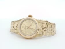 Rolex Oyster Perpetual Lady Champagne Dial 24MM Solid 14kt Yellow Gold 67197
